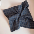 Detail of blue plaid fabric hair scrunchie with classic grid pattern weave texture - Navy Blue Plaid - Wide Edge