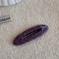 Dettaglio del fermaglio per capelli in tessuto a spina di pesce viola con piccolo fiocco - Stile Fiocco Piccolo Ovale Tweed Viola
