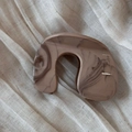 Detail of khaki marble ink pattern on large shark hair claw clip over beige fabric - Letter N Style (Khaki Ink)