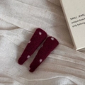 Detail of two burgundy wool hair clips with white polka dots on soft beige linen fabric - Woolen Red Dot Triangle Hairpin Pair