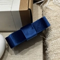 Close-up of sapphire blue velvet double bow hair clip with luxury layered texture and finish - Navy Blue