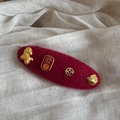 Detailed view of red velvet hair clip with gold lucky coins and Chinese fortune charms - New Year Hair Clip - Oval (FJ891931)