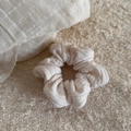 Close-up of cream knit scrunchie texture and pleated fabric detail on plush background - Cable Knit Scrunchie-Beige White