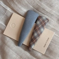 Close-up of minimalist blue fabric and plaid BB hair clips on a textured card - Blue Solid Plaid Triangle Clips