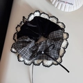 Detail of velvet and checkered scrunchie with lace trim, ribbon bow, and pearl accent - Petal Edge - Patchwork Scrunchie