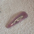 Detail shot of purple translucent acetate teardrop hair clip on soft white fleece - Light Purple