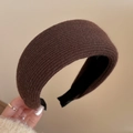 Detail of a thick brown knitted sponge headband with non-slip lining and soft texture - Dark Coffee