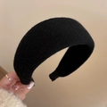 Close-up of thick black knitted headband showing the soft texture and premium quality - Black