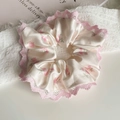 Detail view of cream satin scrunchie with pink rose floral print and delicate lace trim - Pink Lace - Large Scrunchie (15cm)