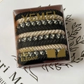 Detalle del conjunto de gomas de pelo trenzadas de alta elasticidad en caja de regalo - Gris Arroz Negro