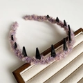 Dettaglio della fascia in lana viola e beige con denti antiscivolo in plastica nera - Viola Chiaro