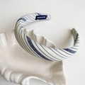 Detailed view of handmade blue and white striped headband with diamond embroidery - White
