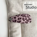 Close-up of purple leopard print hair clip with silver brand tag on a linen background - Purple Leopard BB Clip / 7cm / BB Clips