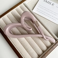 Detail view of pink matte heart hair claw clip with gold French lettering on side - Matte Pink Heart Style (FJ-1432)