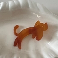 Detailed view of cute cat shaped tortoiseshell acetate hair clip on a white ceramic tray - Cat Shape (Coffee) / Brown