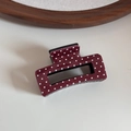 Vue détaillée d'une pince à cheveux en acétate rouge foncé à pois sur fond blanc - Paillettes Rouge Blanc Pois - Petit Rectangle