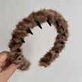 Detail of plush brown wave headband featuring inner anti-slip teeth for secure styling - Tiger Pattern Plush Coffee