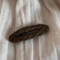 Close-up of vintage moss green tweed fabric wrapped hair clip with textured wool finish - Green Striped - Oval BB Clip