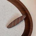 Detail of a brown striped claw clip with fine metallic glitter on a textured surface - Matte Stripe-Long Oval Clip / Coffee