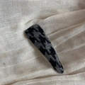 Detail of a vintage houndstooth pattern hair clip on a textured linen background - Black Gray Houndstooth Thin Triangle Style