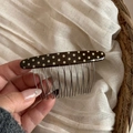 Detail of polka dot acetate hair comb with silver metal teeth for hair styling - Brown