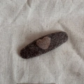Close-up of heart plush hair clip with brown herringbone fabric and soft wool texture - Brown