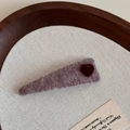 Detail of purple velvet hair clip with a red flocking heart on a wooden tray - Purple