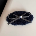 Macro shot of fluffy blue velvet scrunchie with ribbon bow and sparkling gemstone detail - Teddy Fleece BB Hair Clip / Dark Blue