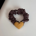 Detailed macro view of vintage floral print hair scrunchie with yellow heart fabric charm - Orange Coffee Patchwork - Heart Hair Tie