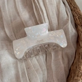 Elegant rectangle acetate hair claw clip with golden text detail on beige linen fabric - Mermaid White