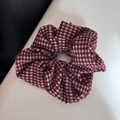 Close-up detail of red and white houndstooth fabric texture on an elastic headband - Grid Scrunchie - Beige/Red