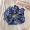Detail of blue and white plaid scrunchie with textured cotton fabric on beige cloth - Classic Plaid - Blue Gray Plaid