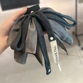Denim grey bow hair claw clip with woven rope texture and minimalist branding - Bowknot High Ponytail Claw / Grey Drooping Knot