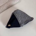 Detailed close-up of knitted fabric clip with a gold 'love' metal label and ribbed texture - Color Block Triangle Claw Clip / Grey Knitted Colorblock Triangle Clip