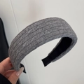 Close-up of gray knitted headband showing ribbed texture and black anti-slip lining detail - Ribbed Wide Headband / Grey Knitted Wide Headband