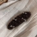 Detail of a brown wool felt hair clip decorated with sparkling rhinestone hearts - Rhinestone Bow Oval - Brown