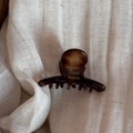 Close-up of tortoise shell acetate hair claw clip with France Handmade lettering - Tortoiseshell Brown