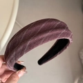 Close-up of thick wine red fabric headband with white diagonal twill texture detail - Red Padded Headband