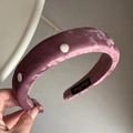 Close-up of pink velvet padded headband with white polka dots and elegant satin finish - Velvet Polka Dot Headband - Deep Pink