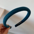 Detail view of the handmade teal knit headband featuring a padded vintage sponge design - Solid Color Woolen Narrow Headband / Blue