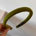Detail of green handmade knitted sponge headband with woven texture and tag - Solid Color Woolen Narrow Headband / Green