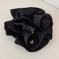 Detail of black striped hair scrunchie with a silver heart-shaped metal pendant charm - Striped Tie Scrunchie - Black
