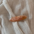 Detail of oval acetate hair clip with pink marble texture and handmade lettering - Gold Label Acetate Oval Clip / Orange Apricot