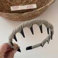Detail shot of light grey corduroy wavy headband with anti-slip shark tooth inner comb - Off White