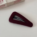 Macro detail of dark burgundy knitted fabric wrapping on a triangular metal BB hair clip - Hollow Triangle BB Clip - Red