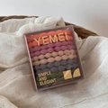 Macro shot of colorful high-elasticity hair ties set in a clear minimalist box - Lotus Section Orange Pink Grey Green