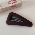 Detail of dark brown knitted triangular BB clip with premium soft fabric texture - Hollow Triangle BB Clip - Coffee