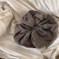 Detail of coffee brown striped fabric scrunchie on a soft cream textile background - Coffee Beige Striped Scrunchie