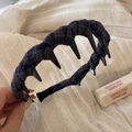 Detail view of retro plaid fabric headband with inner teeth for secure hair styling - Long Teeth Style - Navy Plaid