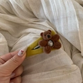 Detailed close-up of a yellow flocked hair clip featuring a cute brown bear with a rhinestone - Coffee Solid Bear BB Clip